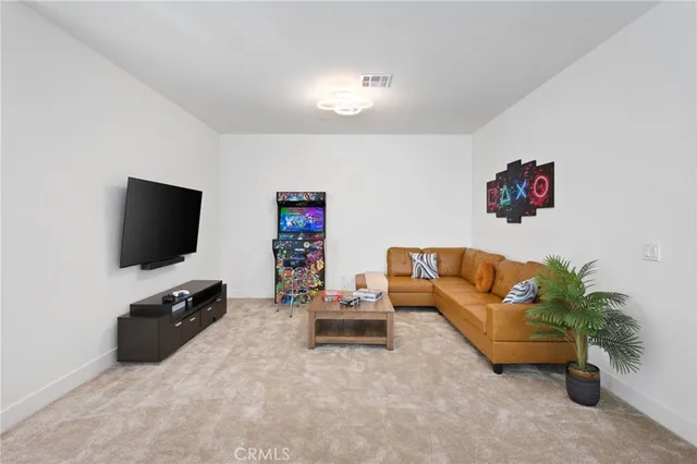 a bedroom with a bed and table