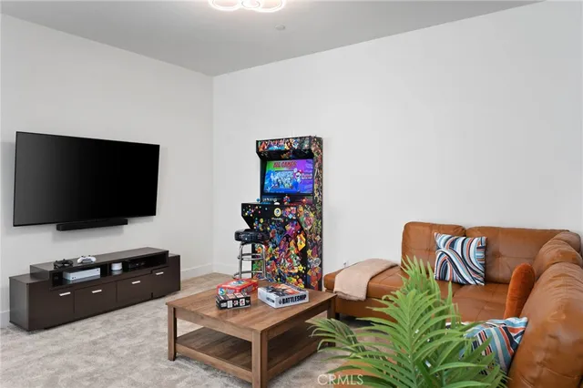 a bedroom with a bed and a lamp