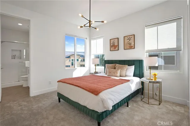 a bed room with a bed and a night stand