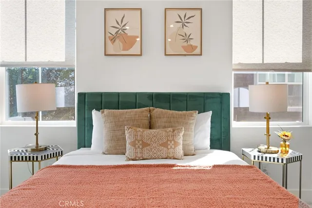 a spacious bathroom with a shower sink double and mirror