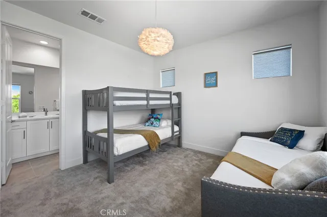 a view of backyard with outdoor seating