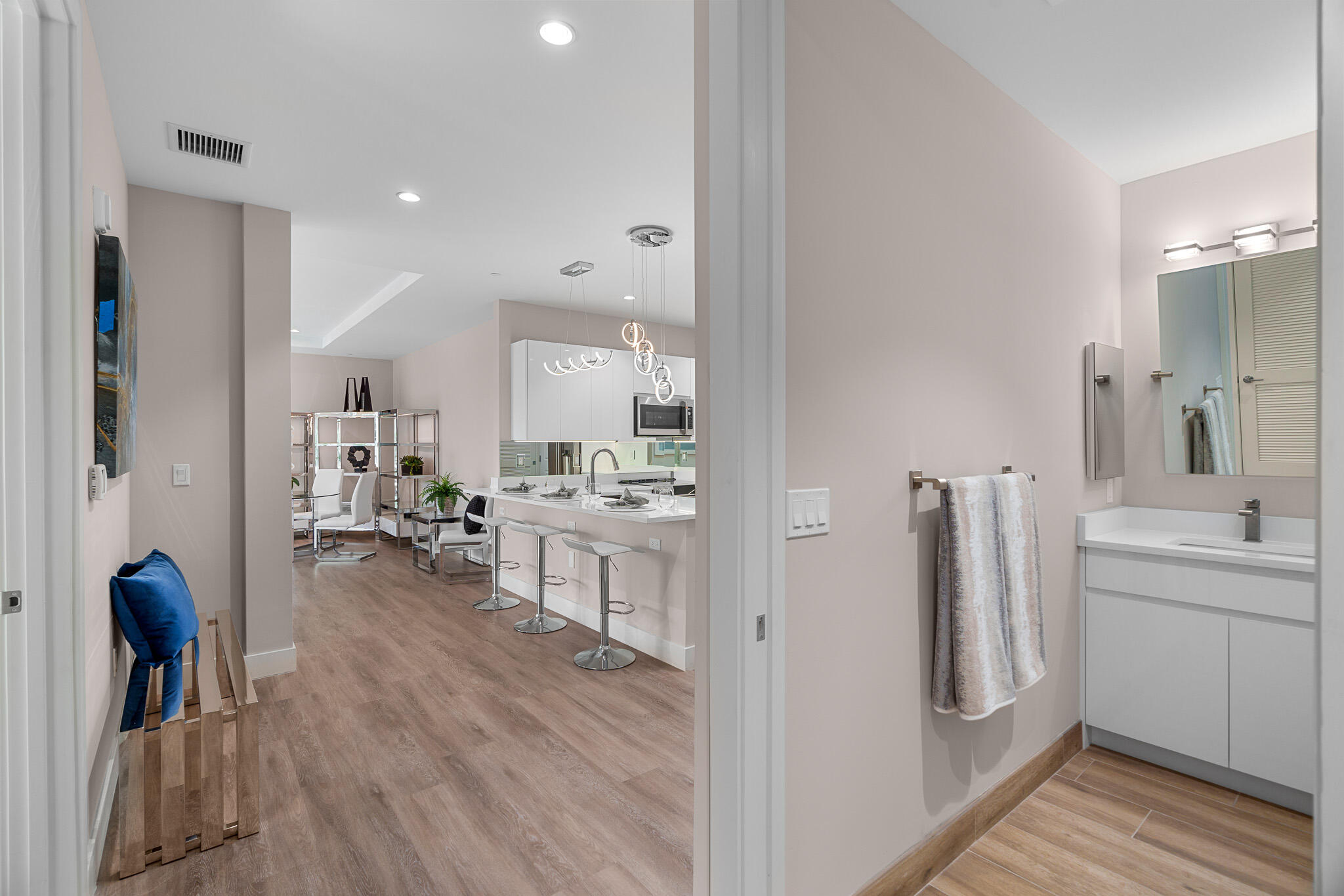 41 Southwest Seminole Street, Unit 310 Stuart, FL 34994 - Photo 14 of 55 a very nice looking room with a large window and wooden floor