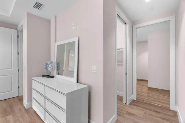 a view of entryway with wooden floor