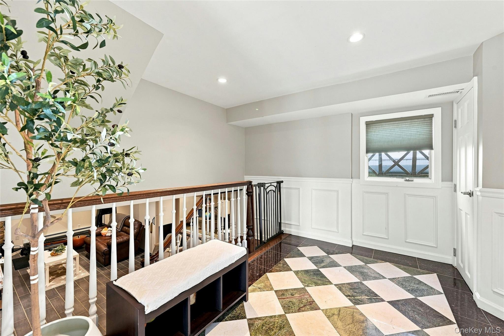 2 Peppermill Road Roslyn, NY 11576 - Photo 5 of 36 Foyer leads to a laundry room and half bath and the lower level