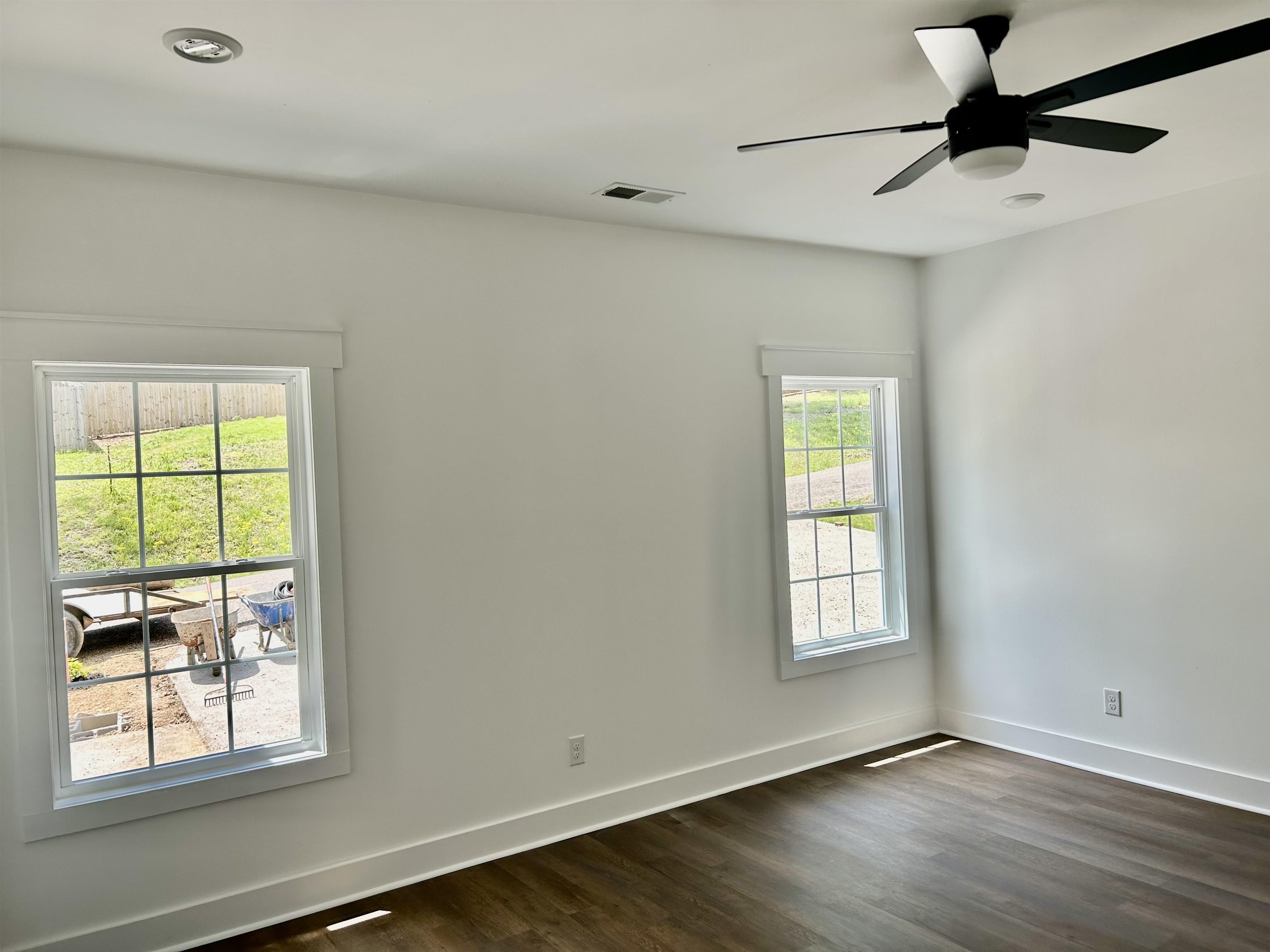 35 Grapevine Cove Counce, TN 38326 - Photo 7 of 25 a view of an empty room with a window and wooden floor
