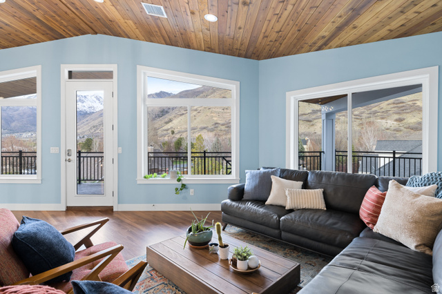 1263 Chapman Court Alpine, UT 84004 - Photo 74 of 83 Living room with a vaulted wood ceiling, wood finished floors, and a mountain view