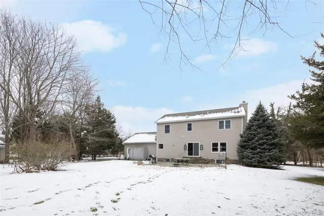 a view of white house with a snow