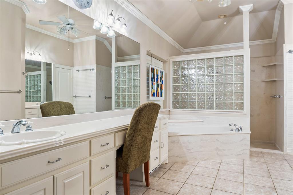 4451 Shiloh Road Midlothian, TX 76065 - Photo 17 of 39 Primary bathroom features over sized shower and nice vanity.