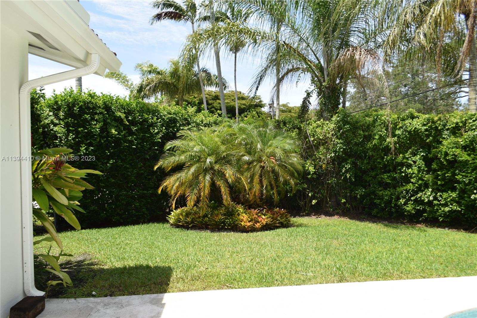 7115 Southwest 69th Court Miami, FL 33143 - Photo 14 of 58 a view of a garden