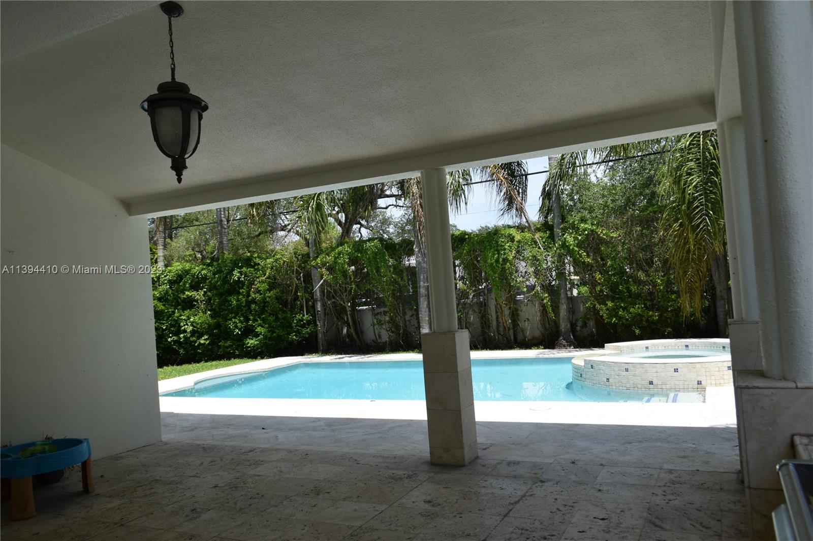 7115 Southwest 69th Court Miami, FL 33143 - Photo 17 of 58 a view of a room with a swimming pool