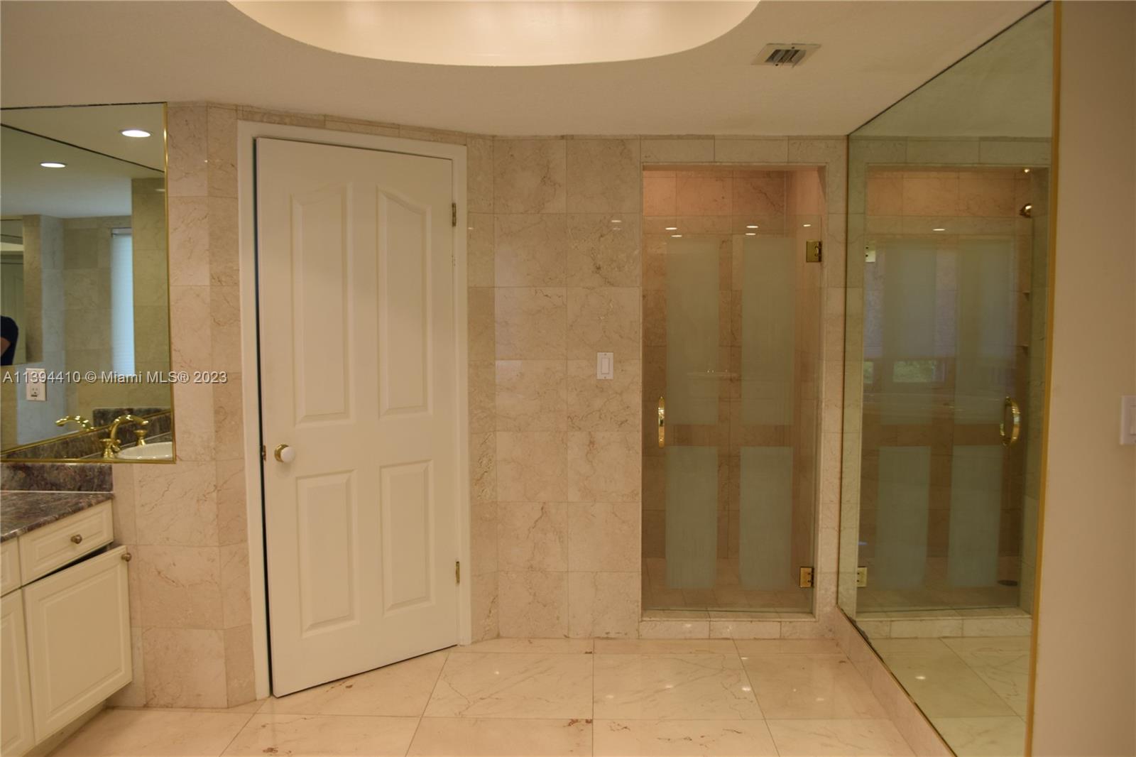 7115 Southwest 69th Court Miami, FL 33143 - Photo 24 of 58 a bathroom with a shower