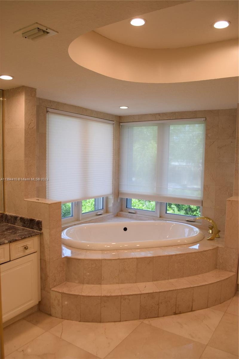 7115 Southwest 69th Court Miami, FL 33143 - Photo 25 of 58 a hallway with a window