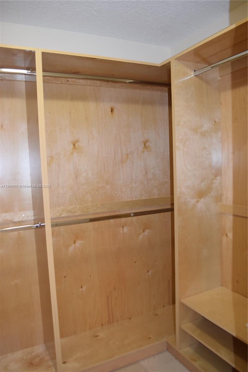 7115 Southwest 69th Court Miami, FL 33143 - Photo 27 of 58 a bathroom with a glass shower