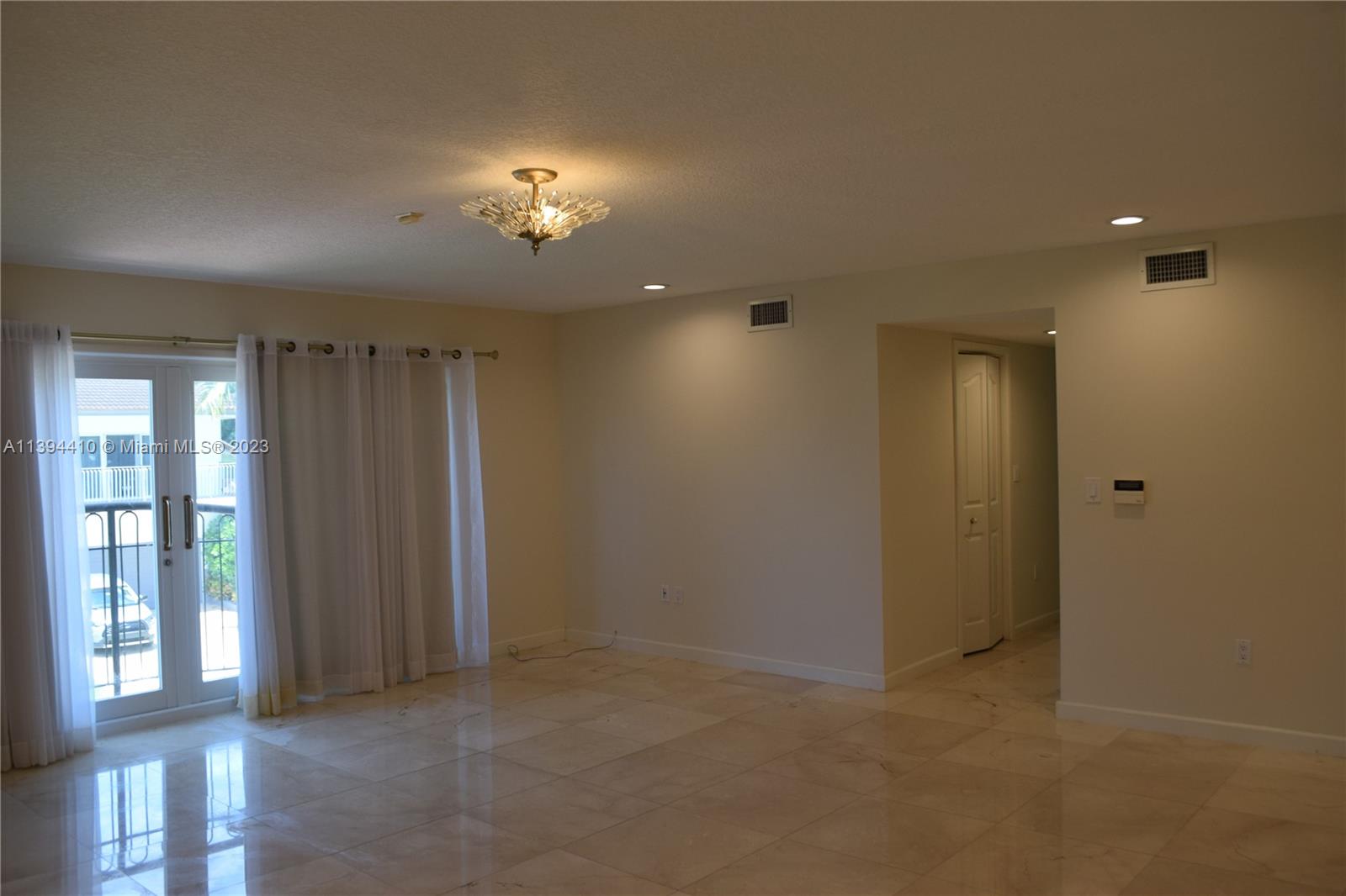 7115 Southwest 69th Court Miami, FL 33143 - Photo 29 of 58 a view of an empty room with a window