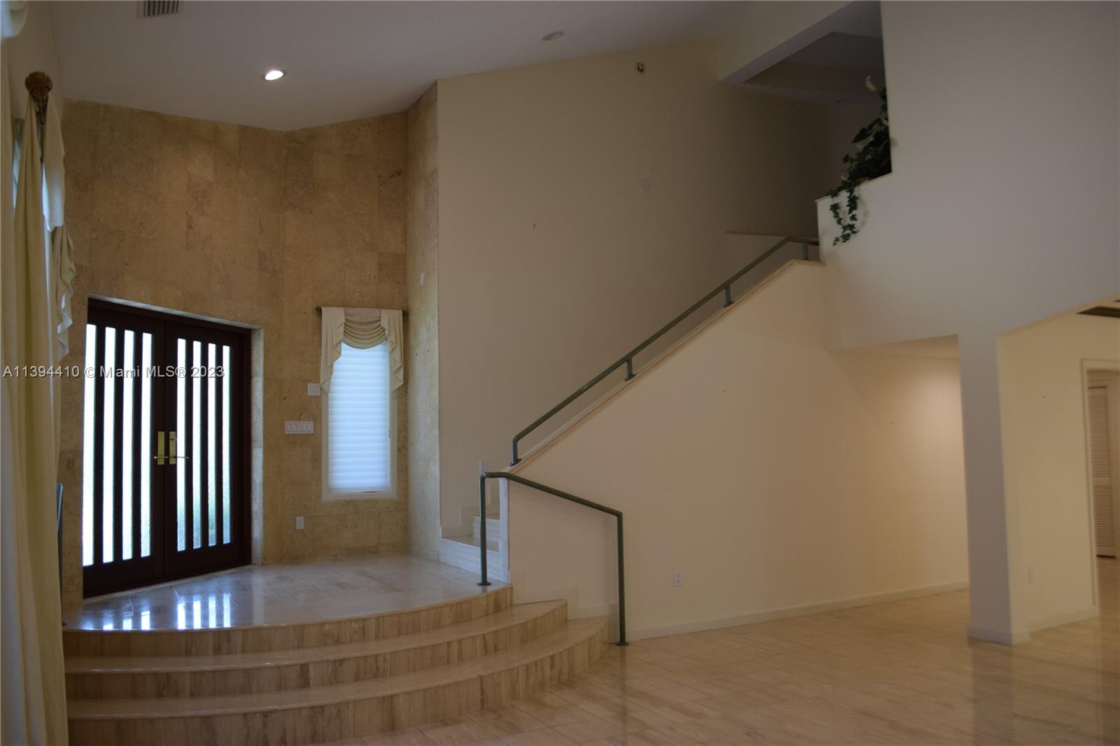 7115 Southwest 69th Court Miami, FL 33143 - Photo 3 of 58 a view of entryway