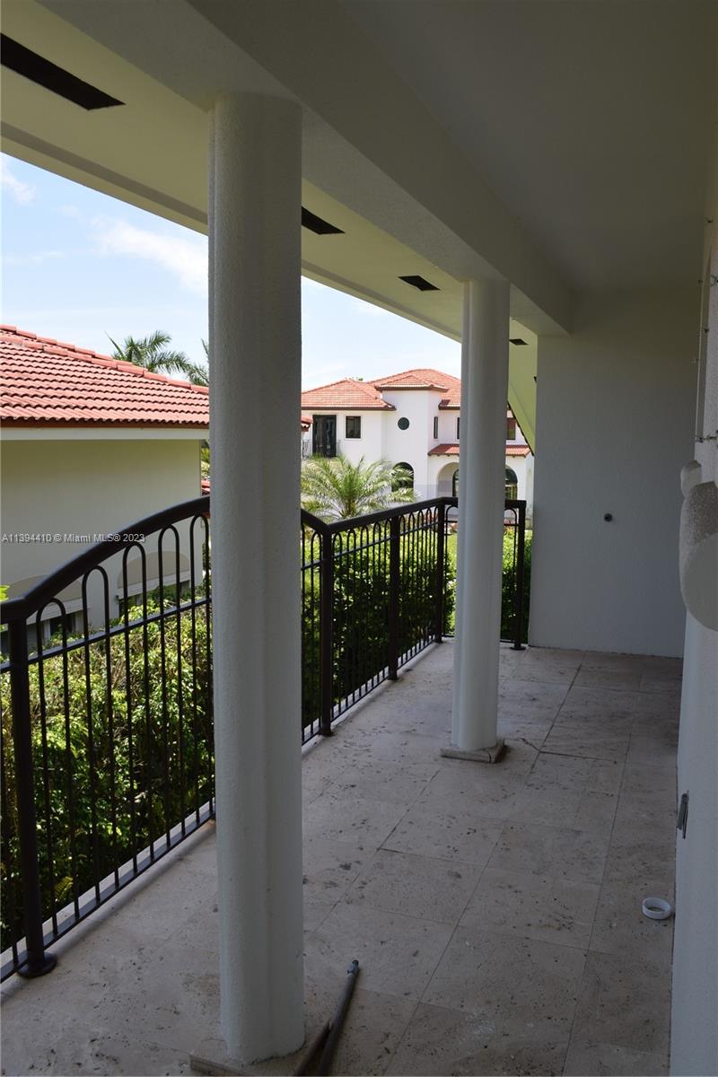 7115 Southwest 69th Court Miami, FL 33143 - Photo 34 of 58 a view of a porch