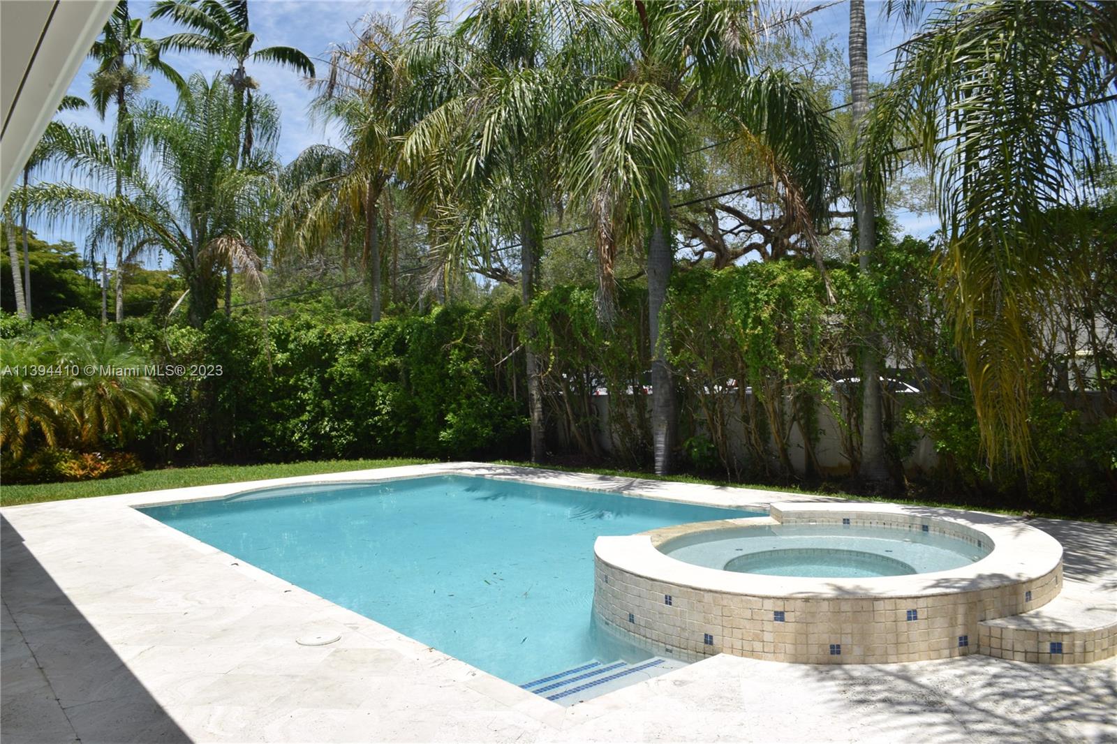 7115 Southwest 69th Court Miami, FL 33143 - Photo 54 of 58 a swimming pool with an outdoor space