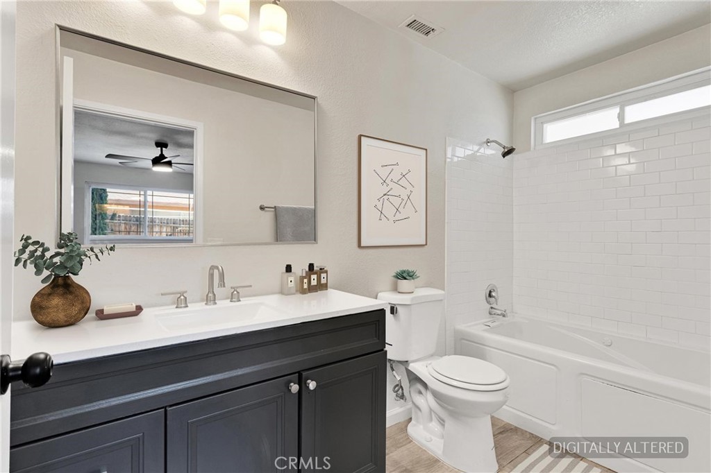 21985 Maumee Road Apple Valley, CA 92308 - Photo 19 of 28 Primary Bathroom (Disclaimer: Some images have been digitally enhanced with virtual staging to illustrate potential room layouts and furnishings. Actual property condition and features may vary. Buyer to verify all information independently).