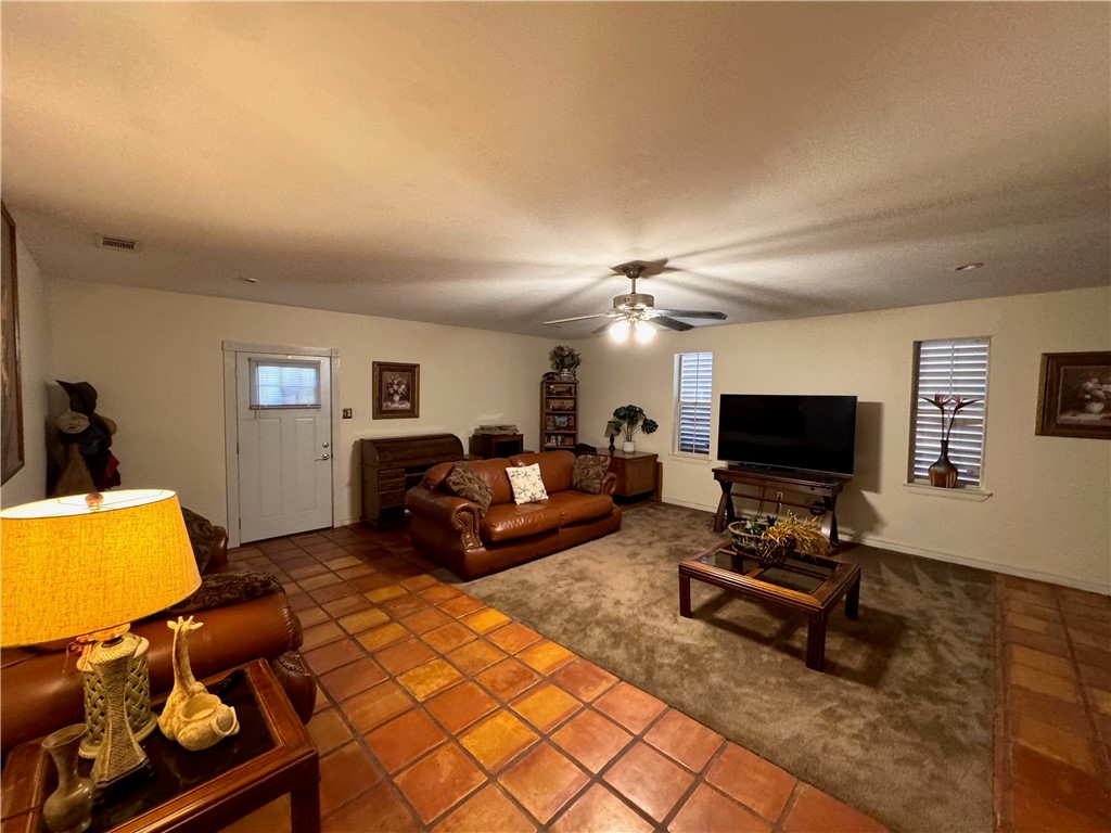 296 County Road 1601 Alice, TX 78332 - Photo 18 of 38 a living room with furniture and a flat screen tv