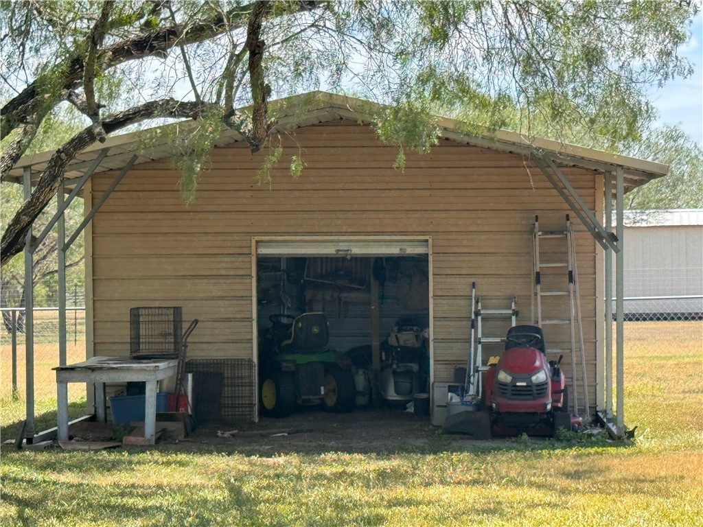 296 County Road 1601 Alice, TX 78332 - Photo 28 of 38 a front view of a house with a yard