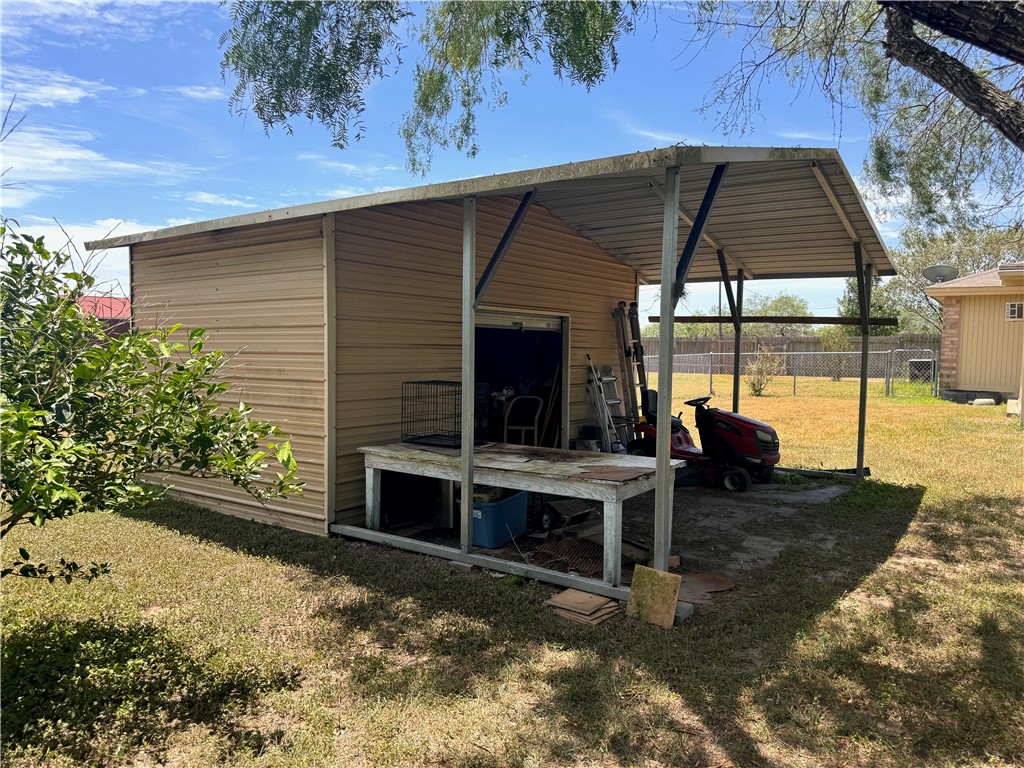 296 County Road 1601 Alice, TX 78332 - Photo 32 of 38 a view of a outdoor space with a patio and a yard