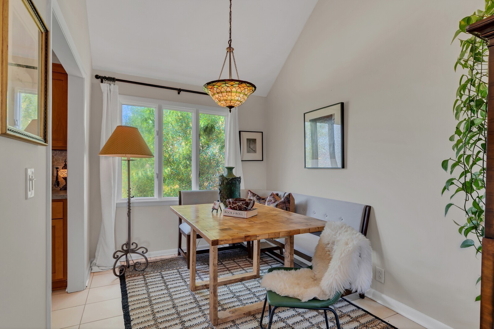 210 Raintree Drive Hermitage, TN 37076 - Photo 12 of 30 a dining room with furniture a chandelier and window