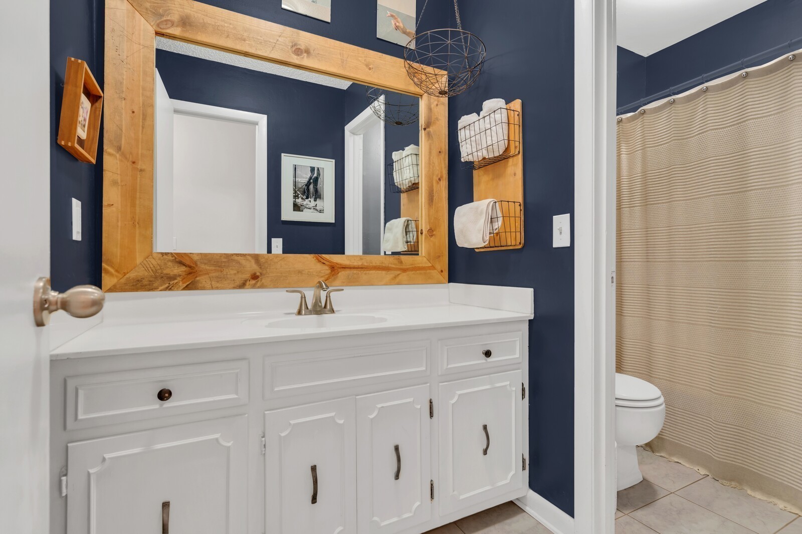 210 Raintree Drive Hermitage, TN 37076 - Photo 16 of 30 a bathroom with a sink and a mirror