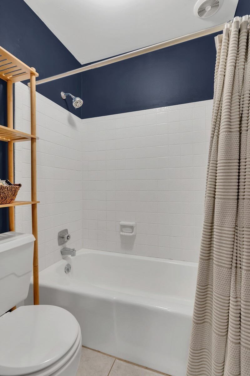210 Raintree Drive Hermitage, TN 37076 - Photo 18 of 30 a bathroom with a toilet and a bathtub