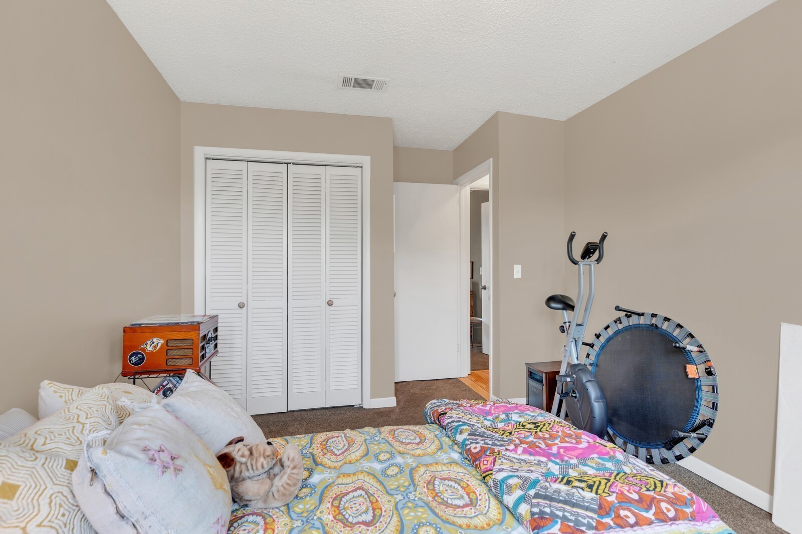 210 Raintree Drive Hermitage, TN 37076 - Photo 26 of 30 a bedroom with bed and storage