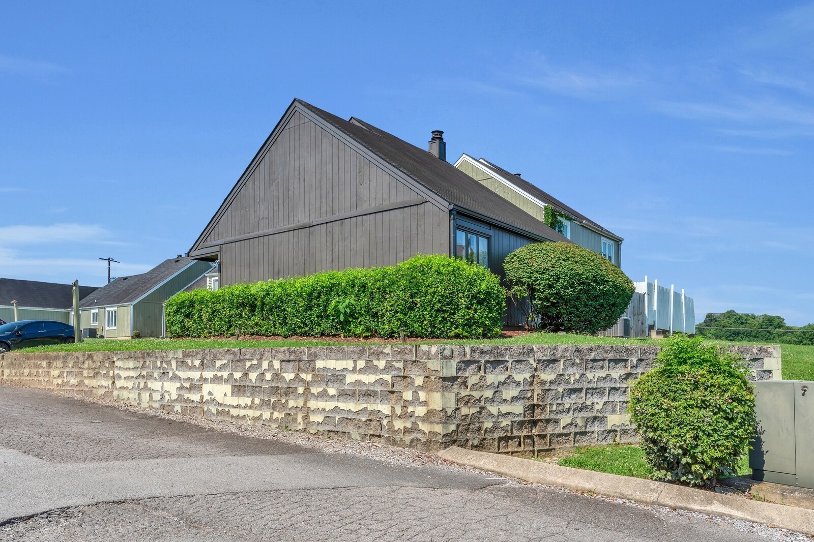 210 Raintree Drive Hermitage, TN 37076 - Photo 29 of 30 a side view of a house with a yard