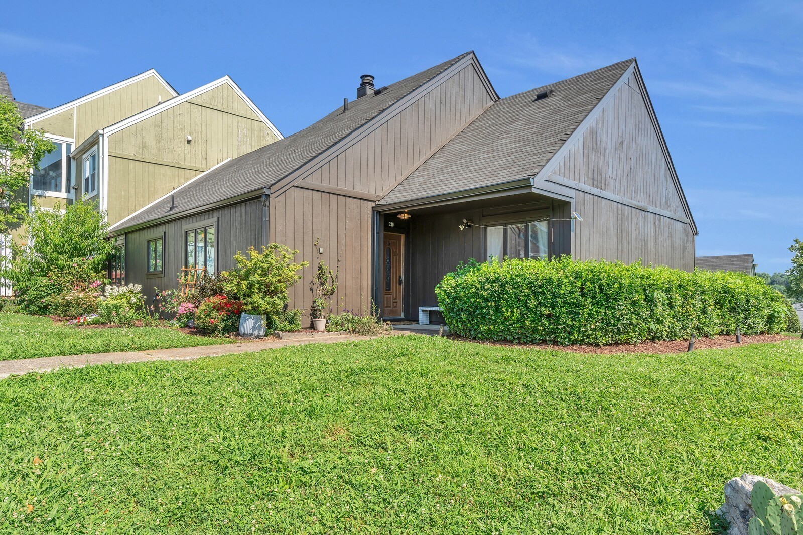 210 Raintree Drive Hermitage, TN 37076 - Photo 3 of 30 a house that is sitting in the grass