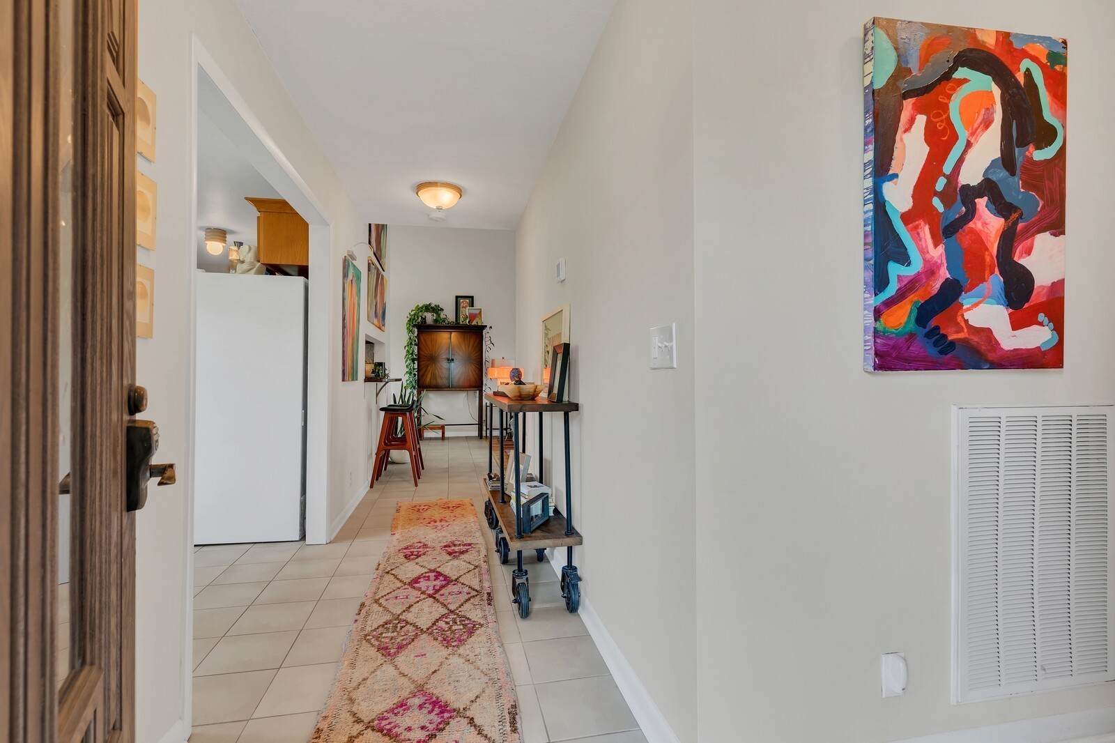 210 Raintree Drive Hermitage, TN 37076 - Photo 5 of 30 a view of a hallway to a livingroom and a couch