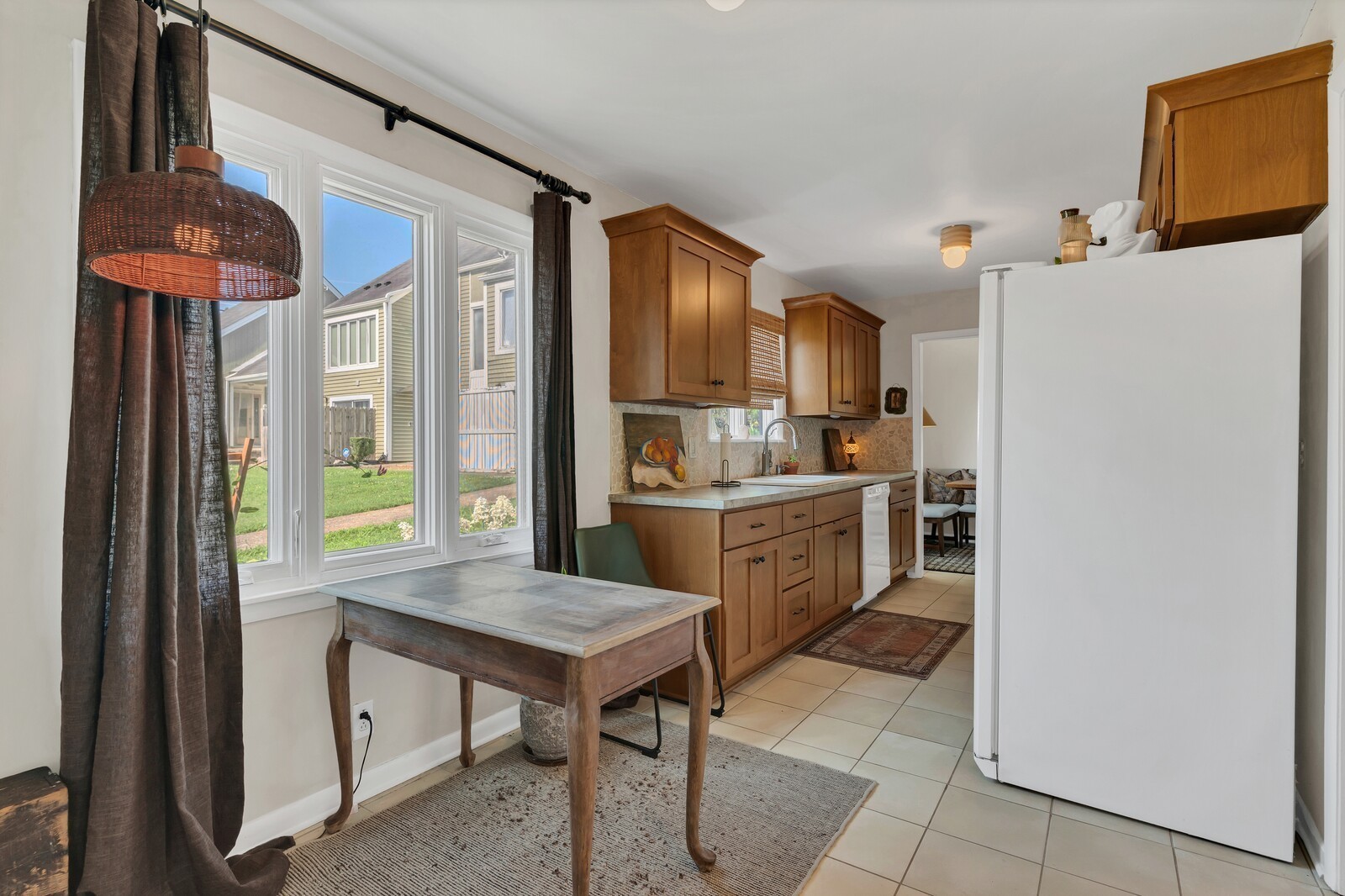 210 Raintree Drive Hermitage, TN 37076 - Photo 7 of 30 a kitchen with a refrigerator a stove top oven a sink and dishwasher