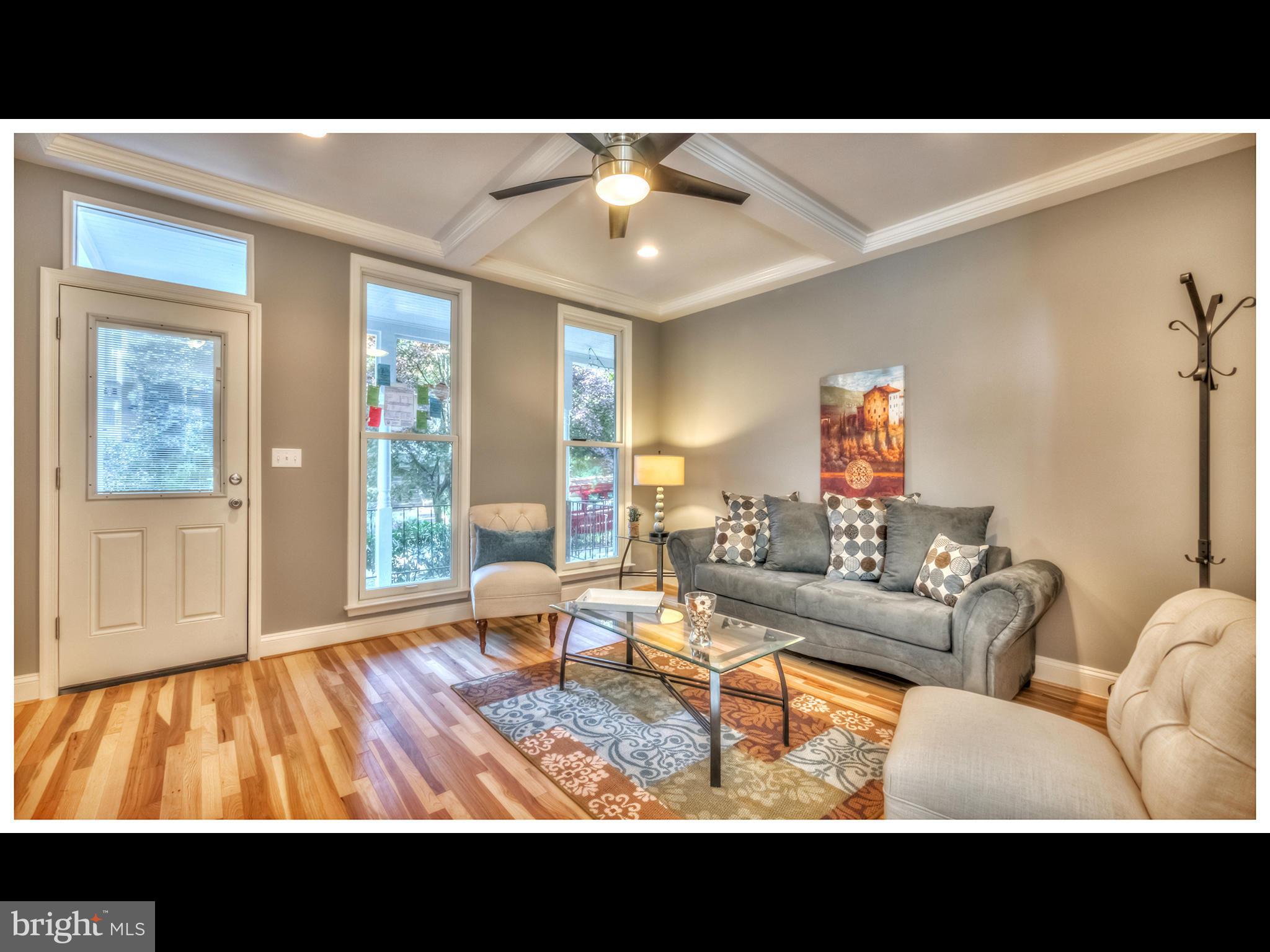 4519 Keswick Road Baltimore, MD 21210 - Photo 5 of 29 a view of living room with furniture and a window
