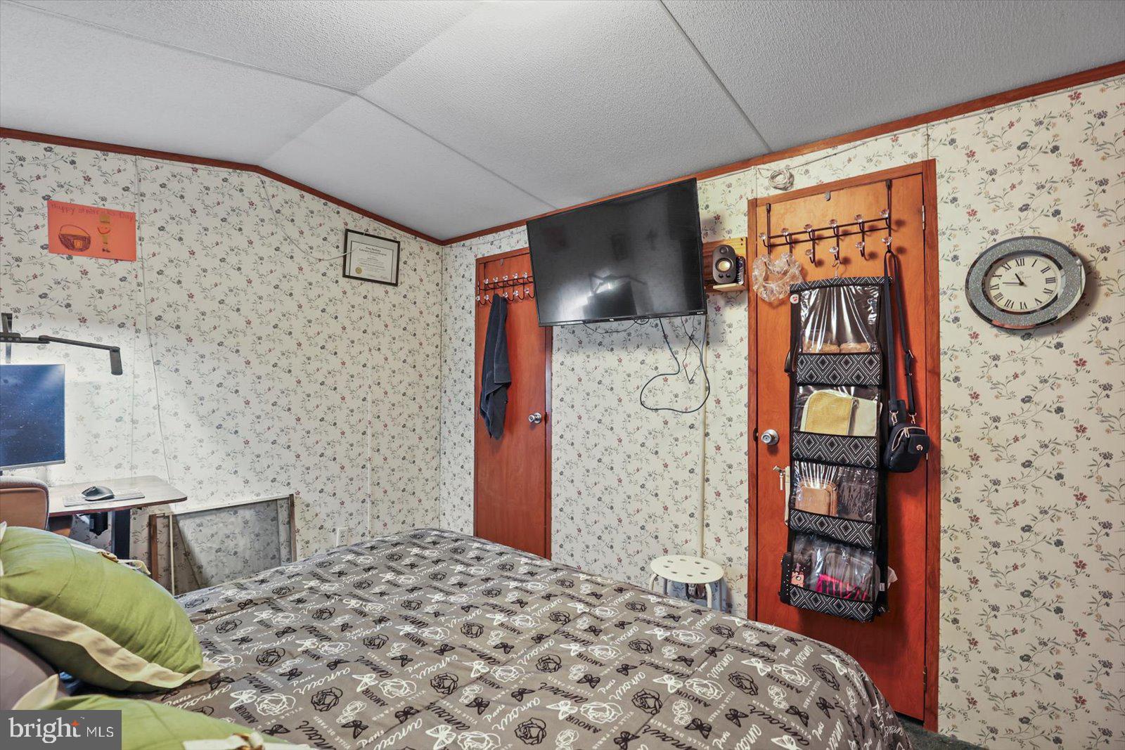 16 Earl Lane Lititz, PA 17543 - Photo 23 of 31 a bedroom with a bed and a chair in it