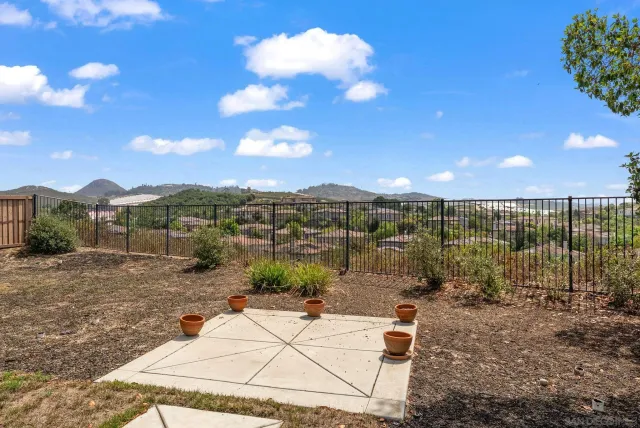 a view of a hallway with windows