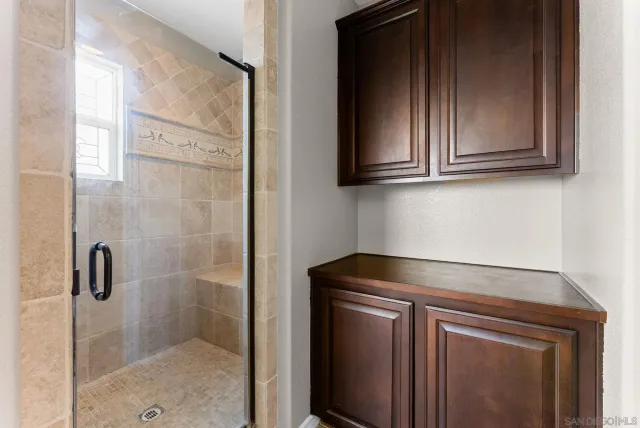 a bathroom with a bathtub and a toilet