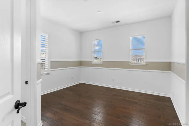 a small space with a book shelf and a shelf