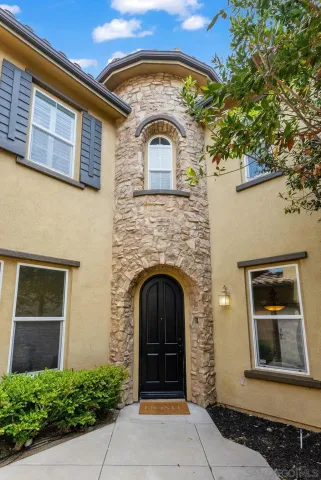 a front view of a house with a door