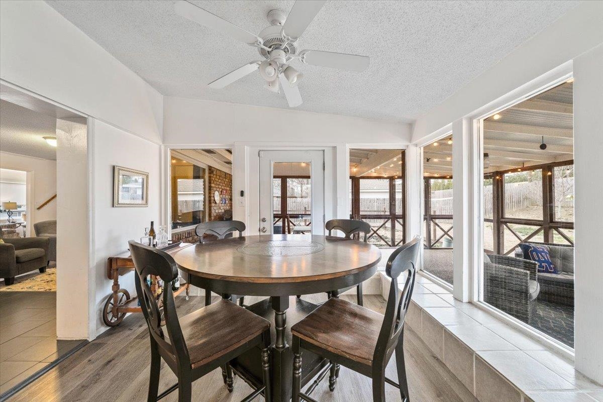 436 Cardinal Drive Collierville, TN 38017 - Photo 14 of 32 a dining room with furniture a chandelier and wooden floor