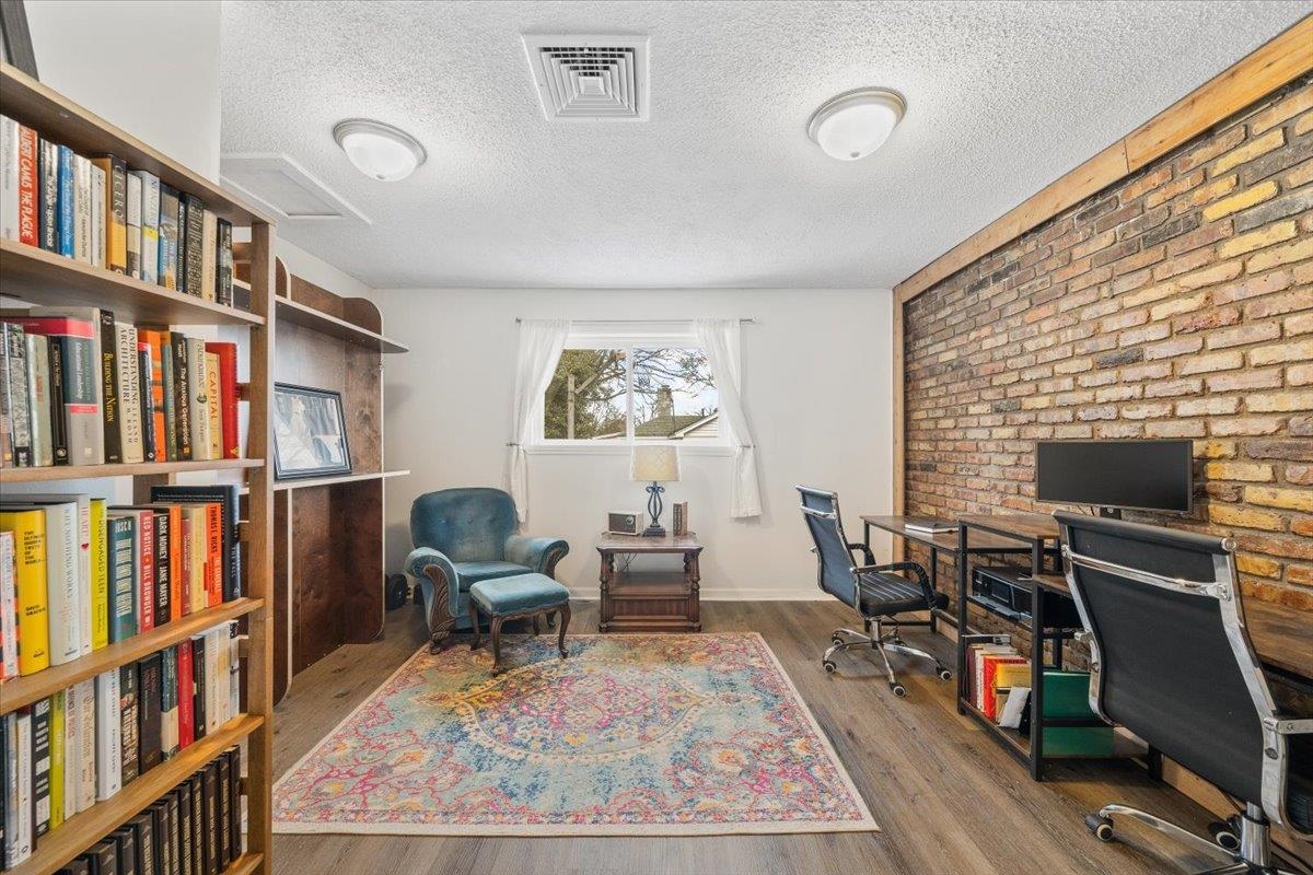 436 Cardinal Drive Collierville, TN 38017 - Photo 15 of 32 a living room with lots of furniture and a book shelf