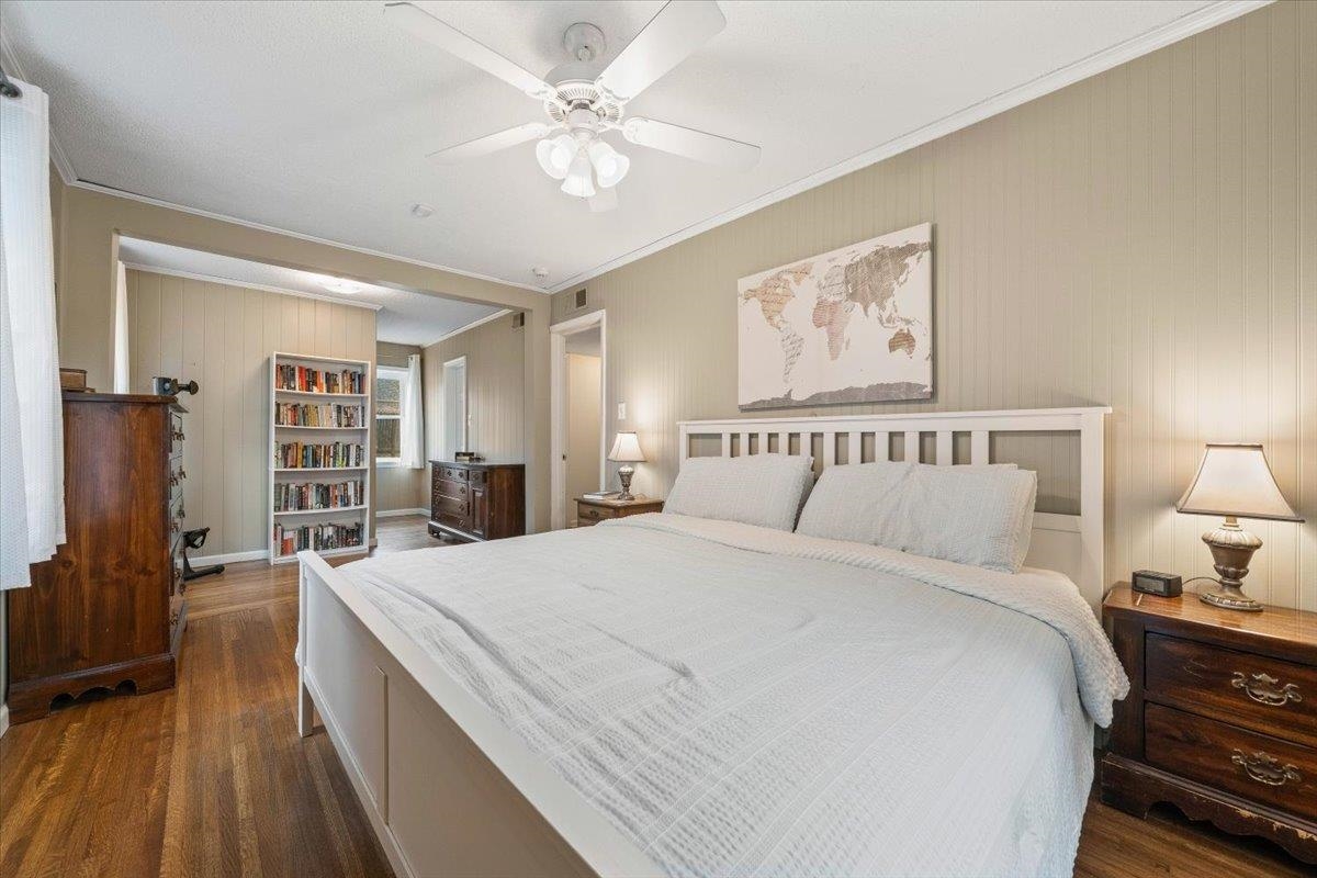 436 Cardinal Drive Collierville, TN 38017 - Photo 17 of 32 a spacious bedroom with a bed and a chandelier