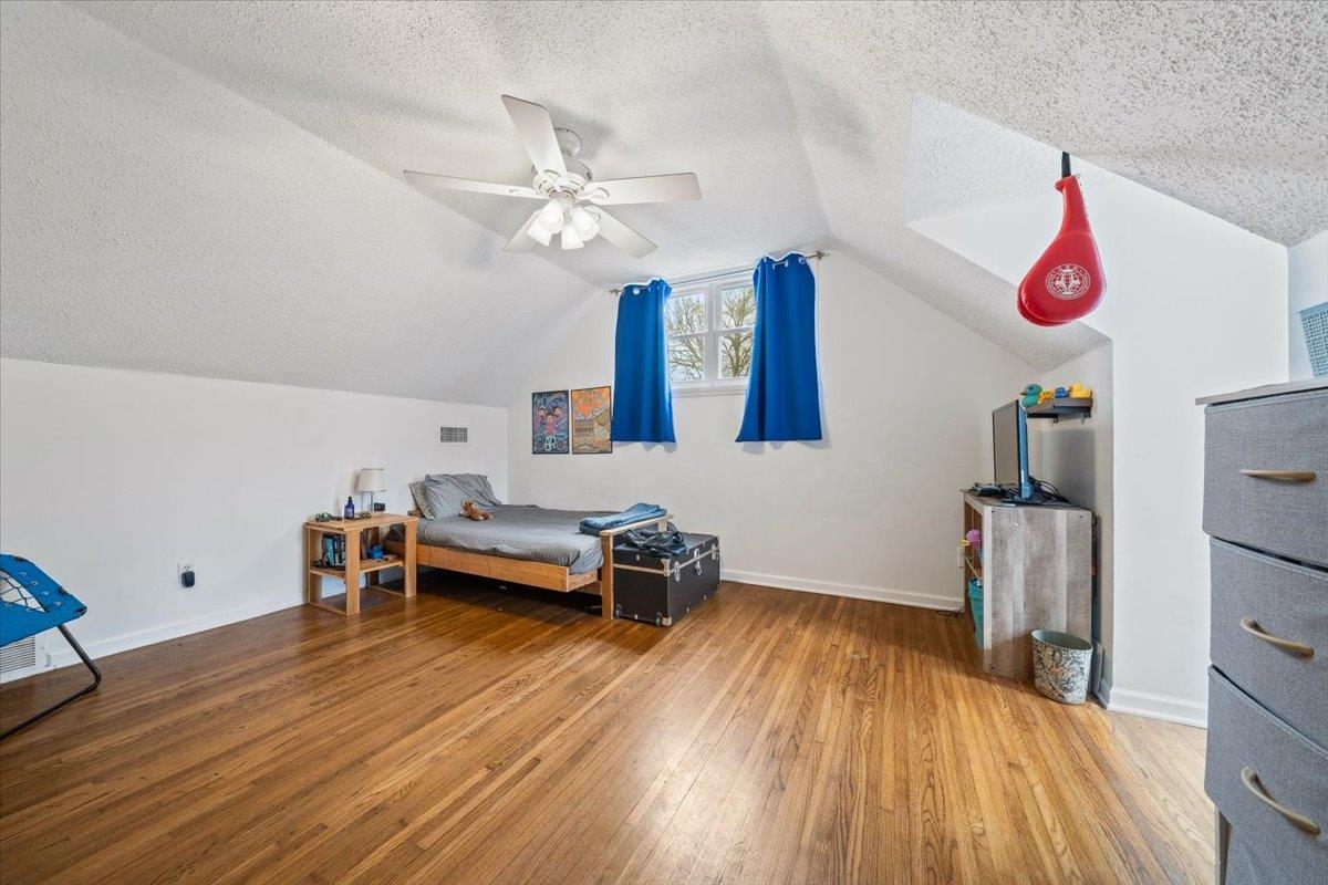 436 Cardinal Drive Collierville, TN 38017 - Photo 20 of 32 a bedroom with furniture and wooden floor