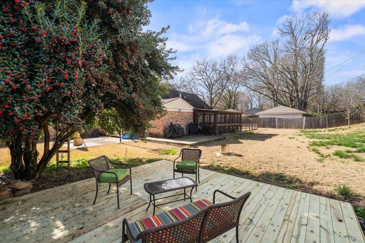 436 Cardinal Drive Collierville, TN 38017 - Photo 25 of 32 a view of backyard with swimming pool and seating space
