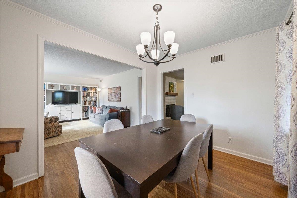 436 Cardinal Drive Collierville, TN 38017 - Photo 6 of 32 a view of a dining room with furniture window and wooden floor