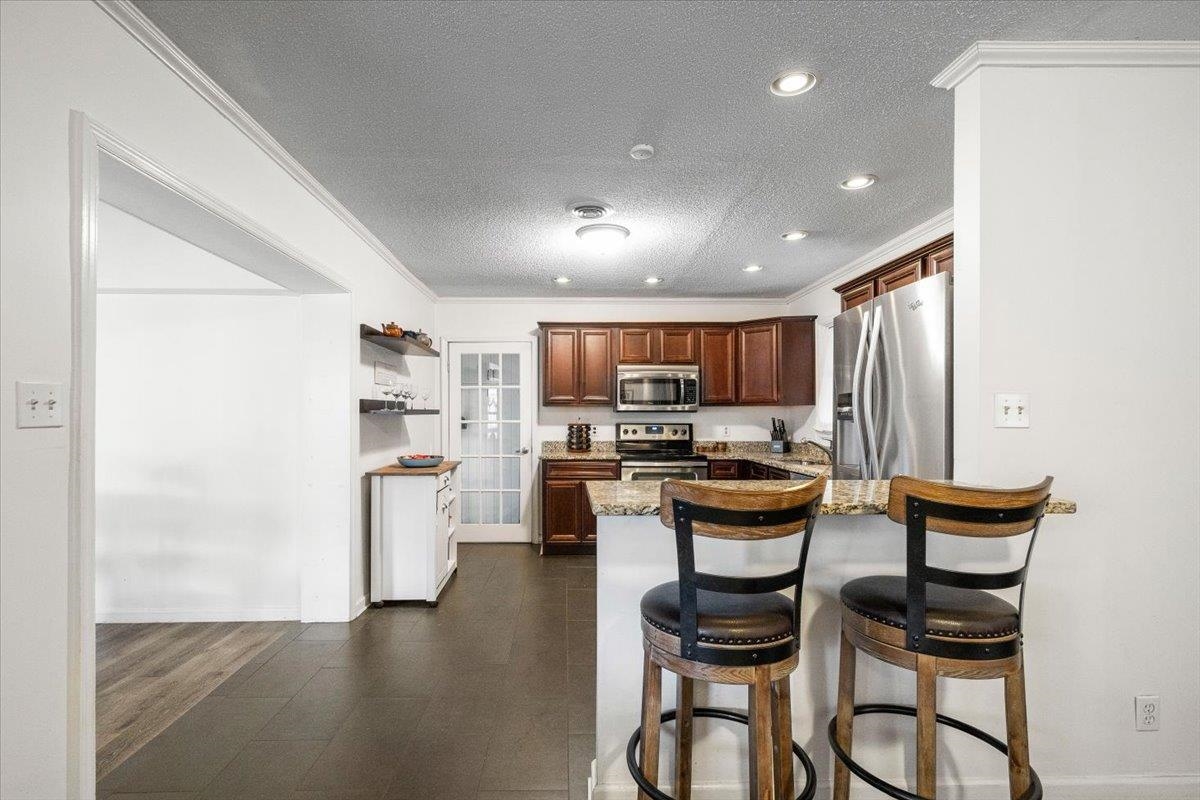 436 Cardinal Drive Collierville, TN 38017 - Photo 10 of 32 a kitchen with a table and chairs in it