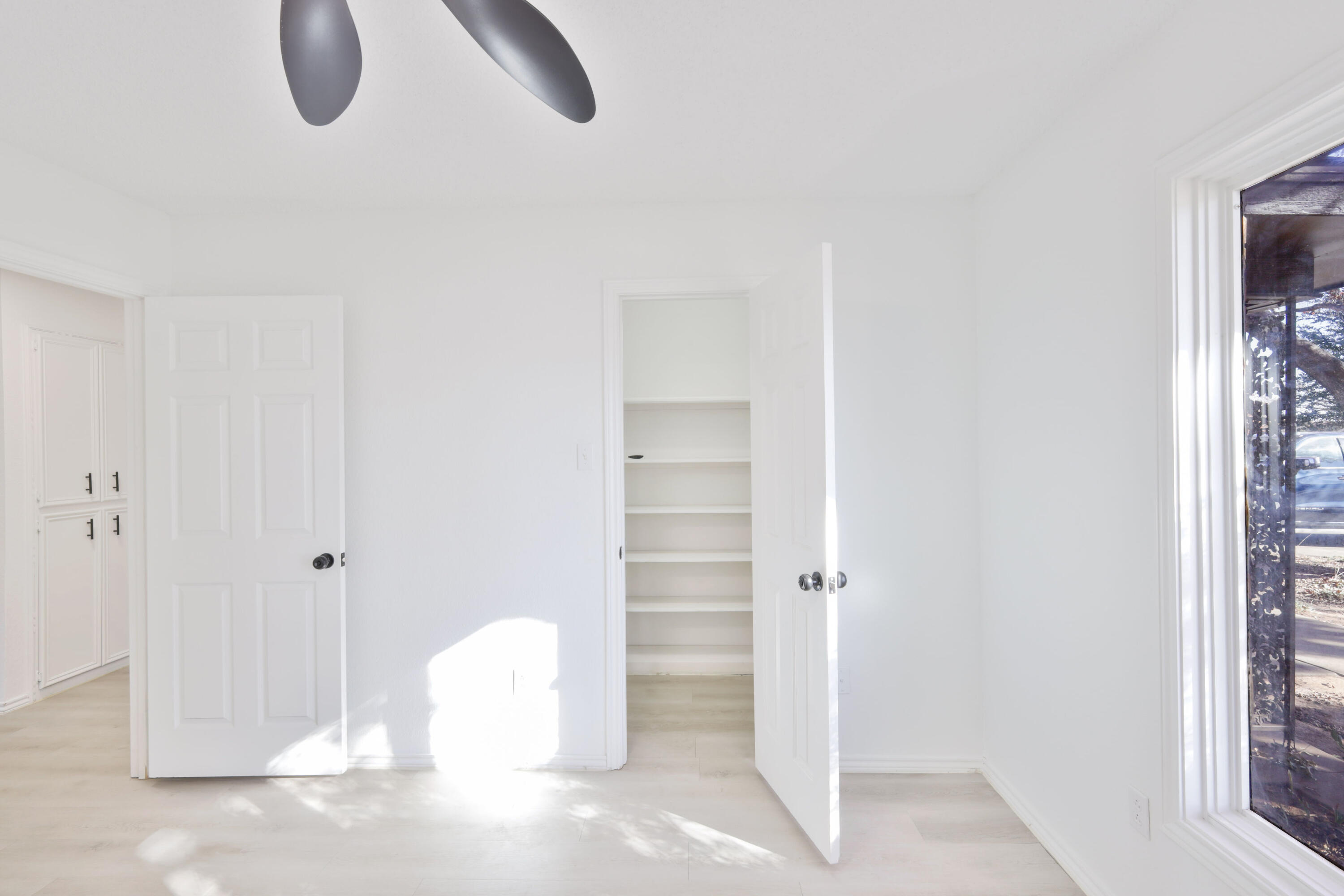 5104 73rd Street Lubbock, TX 79424 - Photo 11 of 20 a view of walk in closet with empty racks