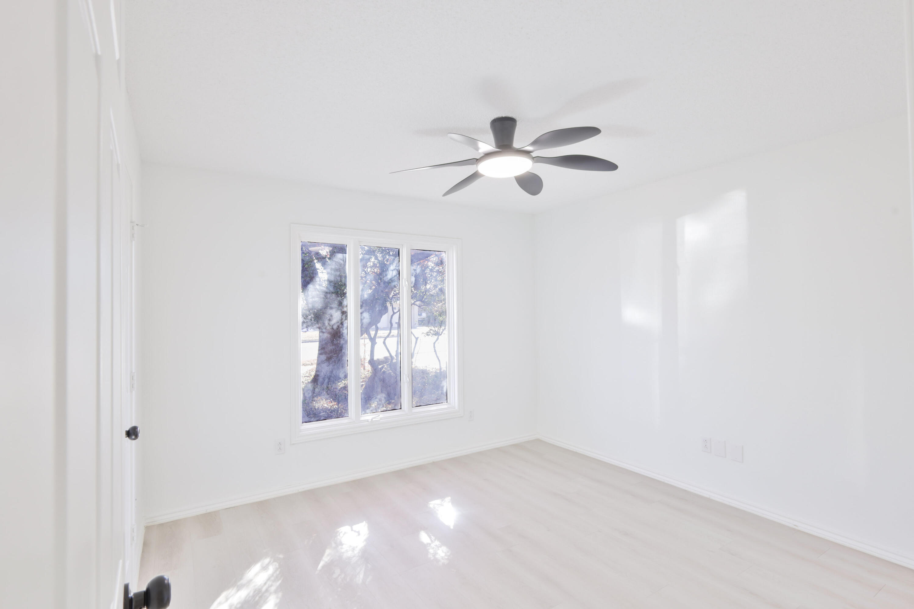 5104 73rd Street Lubbock, TX 79424 - Photo 10 of 20 a view of an empty room with a window