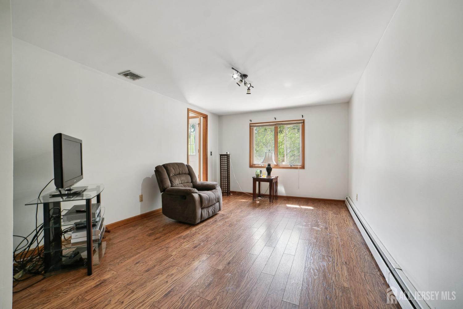 442 Garretson Road Bridgewater, NJ 08807 - Photo 12 of 29 a view of a workspace with furniture and a window