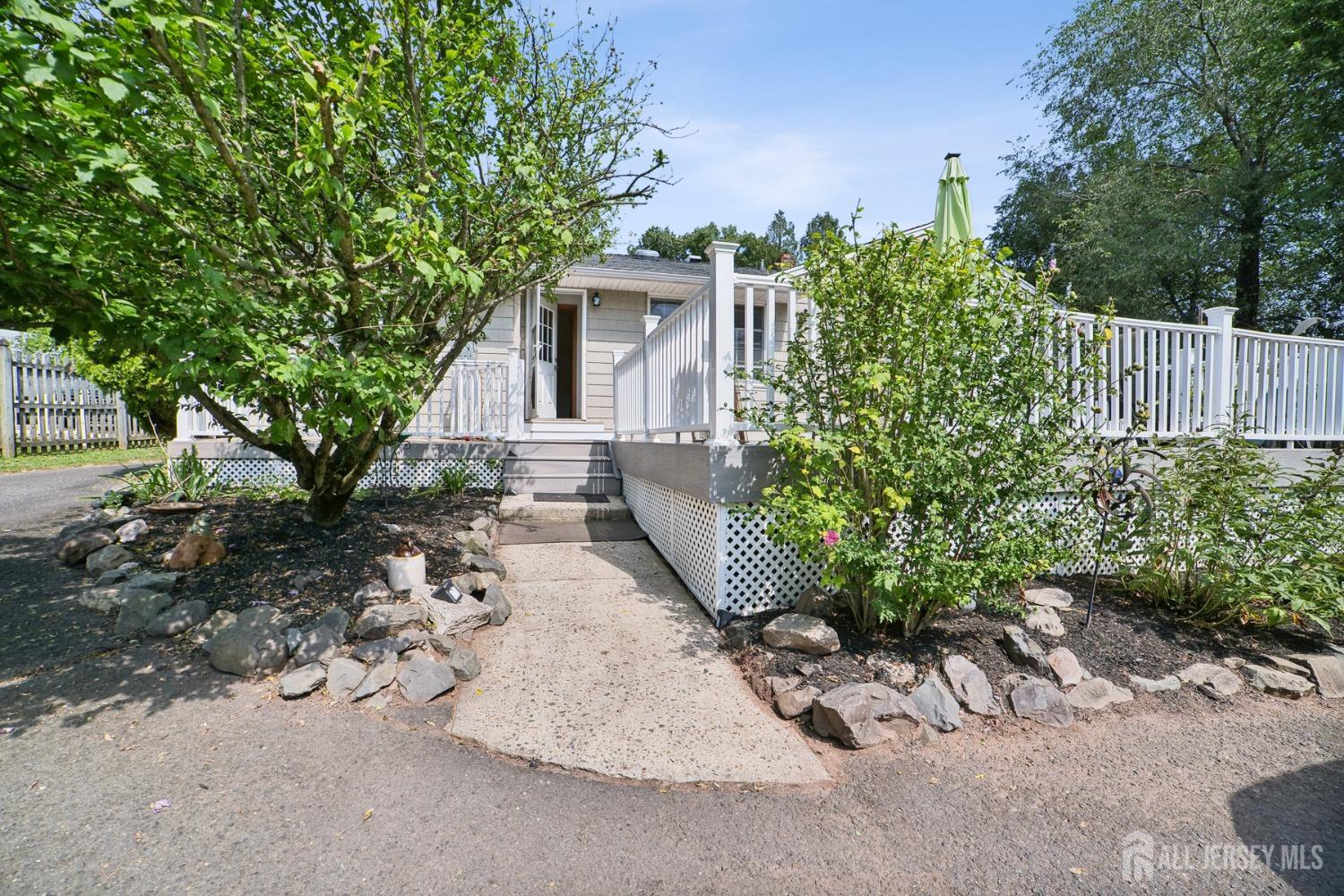 442 Garretson Road Bridgewater, NJ 08807 - Photo 26 of 29 front view of a house with a yard